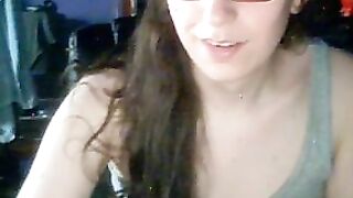 Cute tranny in glasses playing with her melons, butt and rod