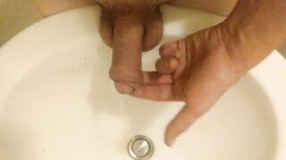 Peeing on my Hand, in a Sink