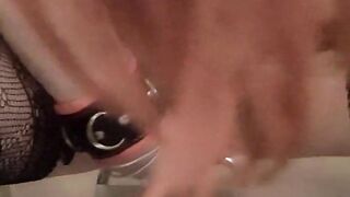 Christina takeing in a giant red plug