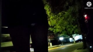 Sissy crossdresser walking outside with a sex-toy inside her booty and a micro chastity cage