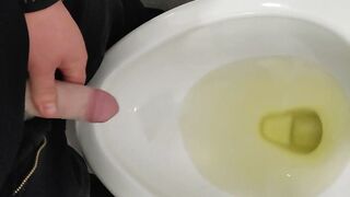 Transman voids urine with Standing to Pee device
