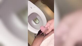 Ladyboy urinate and masturbate in public restroom