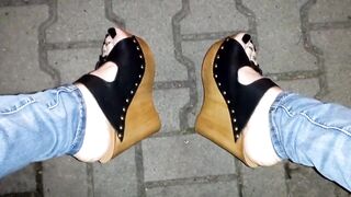 crossdresser shows off her pretty feet in high heel wedges in public