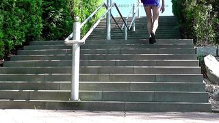 Crossdresser in little Costume outside