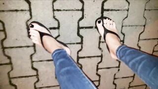 hot crossdresser shows off her astounding feet in platform flip flops on a night walk