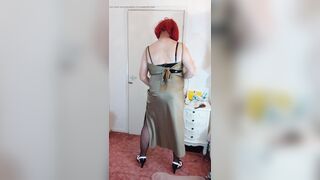 Redhead crossdresser in full length costume