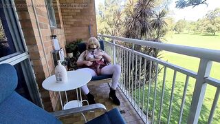 Sissy schoolgirl gagged playing on the balcony and pissing teaser