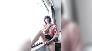 tranny Ting Xuan masturbated near of the hotel window