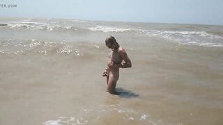 Swimming, splashing and posing nude in the sea...