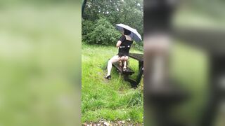 Crossdressing bitch Maid in a public picnic area
