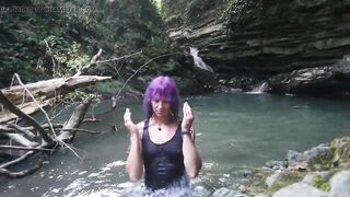Alexa Cosmic transgirl swimming at waterfall in shirt and t-shirt...