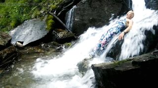 Alexa Cosmic swimming in pretty waterfall wearing colorful combi costume...