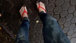 a crossdresser with hot feet in flip flops is tempting on the street