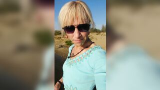 Trans hotty swimming in the lake in raiment blue blouse and white-milk panties.