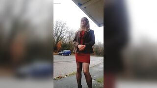 Amateur crossdresser Daisy next to busy main road .
