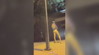 trans hotty takes off her pants in a public space at night