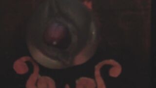 Bad Dragon Vibrator emerging from Fleshlight