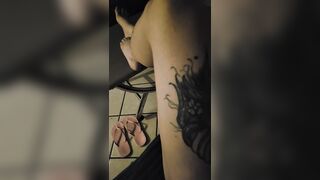 Laying back in my little jumper suit one evening truly slutty with stiletto nails and pointed toes.