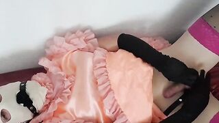 Sissy playing with a sex-toy and cumming in its own throat