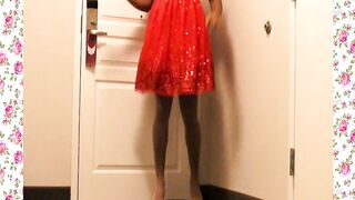 A 1950's SISSY DANCE FOR HER SPOUSE WEARING A PARTY SUIT