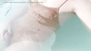 Sissy on hawt gold shiny swimsuit in jacuzzi