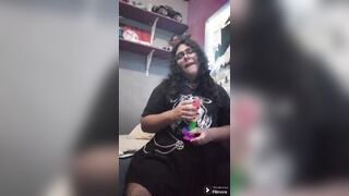 Trans beauty sucks on vibrator