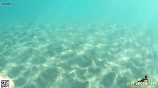 fishnet stocking in public sea and beach