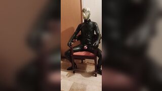 Latex Sissy vibrates in self slavery with chastity and breathplay