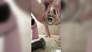 Sissy banging her butt with a large ebony sex toy, new cream and an anal expander