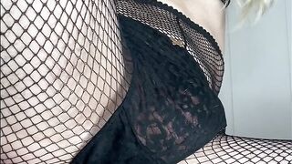 Crossdressing Sissy stuffs butt with sextoy