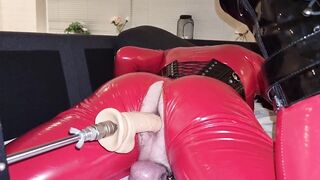 Red Enclosed Doll Screws Itself with Fuckmachine