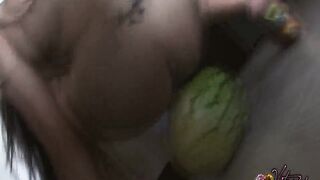 Breasty Oriental beauty bangs a watermelon to get off