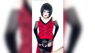 Enormous makeup drag floozy disrobes to underware