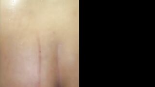 Transgender Lalin girl sticking a bottle up her booty, all the way in