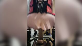 Sissy Ari locked and playing with large dildos