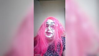 TV clown floozy smokin' a cigarillo and talking indecent