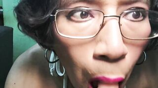 Lascivious trans beauty on camera sucking a rubber ramrod.