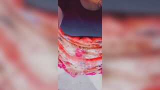 Twitching sissy clitoris below petticoat