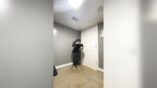 Hawt trans CD in taut gray suit teasing massive schlong