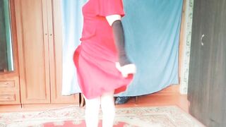 Playful femboy enjoying coffee in silky pink robe