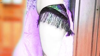 Sissy showing off pastel hair in cute pigtails