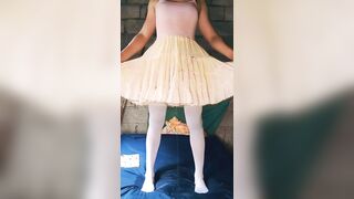 Suddenly Lengthy Piddle Standing In Couch During the time that Wearing Tutu Suit