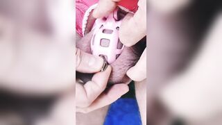 Locked Shy Racoon is banging her urethra with iron bullet