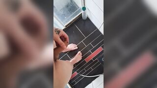 Pissing into the shower with pressure
