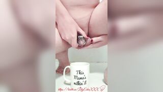 Chastity Floozy Lily Eden Piddles in a Cup and Drinks It
