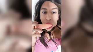 Natalia Valera uses her throat to put a fuck-rubber on her vibrator and rides it
