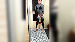 A youthful femboy films herself in the mirror jerking off her clit in red pants, high heels, a mask, and ears.Part two. Censored.