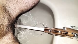 Playing with my twat in the bidet