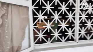 Sissy in Chastity Filled with 2 Beer Enemas, One at the Door