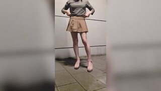Tranny Ting Xuan masturbates outdoors in a miniskirt and high heels.